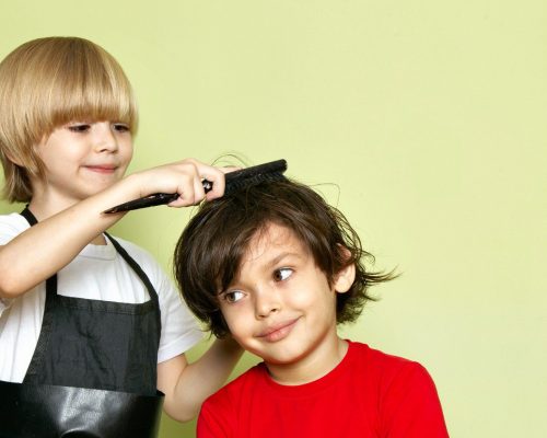 front-view-little-cute-hairdresser-adorable-kid-working_2